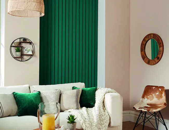 green vertical blinds in a modern living room with white sofa and natural decoR